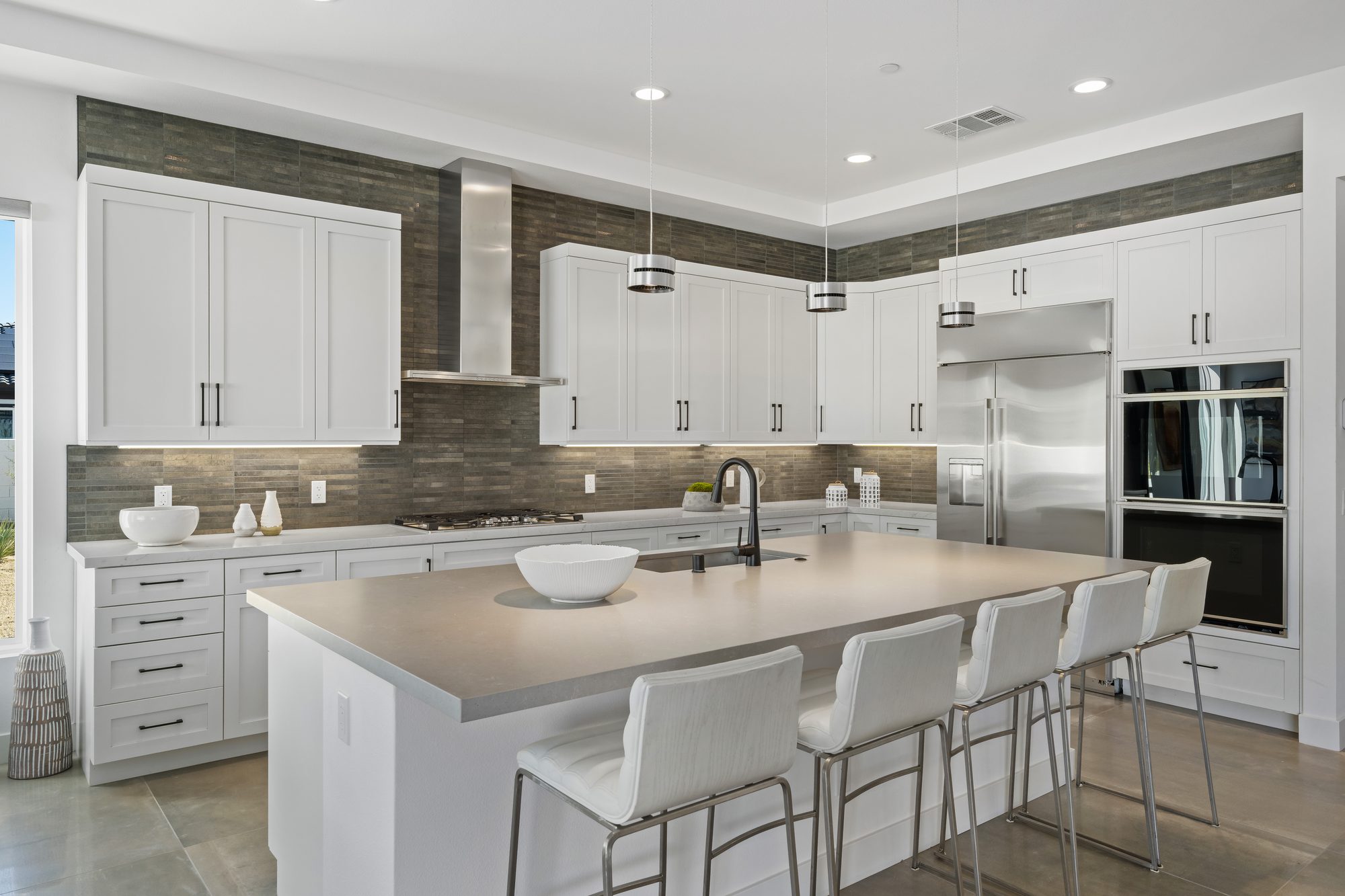 Custom desert kitchen with island and warm natural light